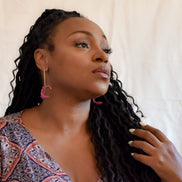 Baumelnde gedrehte Ohrringe